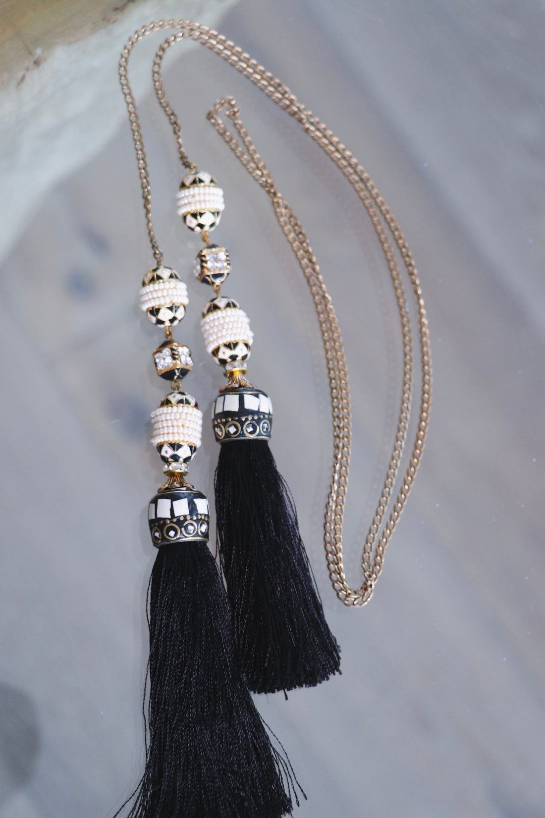 BLACK AND WHITE TASSEL NECKLACE